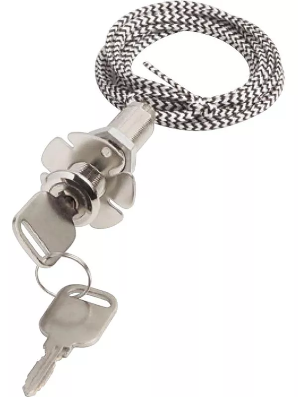 En närbild av en svart, rund nödfrikopplingsanordning med en metallring och en röd dragsnodd.