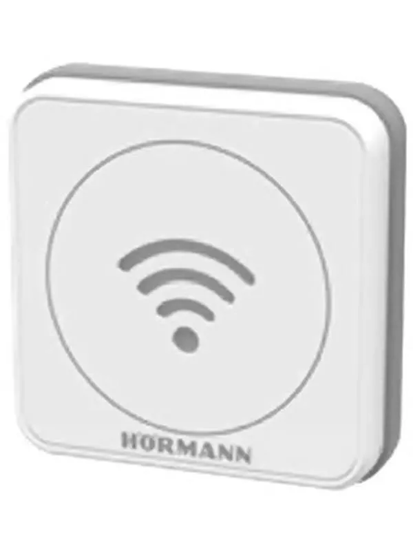 En vit, rektangulär enhet med en sladd, placerad på en vit bakgrund.